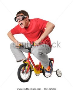 stock-photo-emotional-funny-man-on-a-children-s-bicycle-isolated-on-white-background-82162969